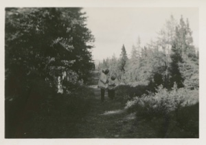 Image of Dr. and Mrs. Hettasch on wooded path